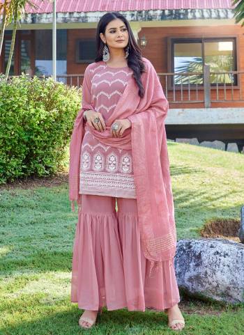 For Pretty Look,Grab These Designer Shahrara Suit In All Over Fine Colored.These Top Is Fabricated On Faux Georgette Pair With Faux Georgette Bottom And Viscose Dupatta.Its Beautified With Designer Embroidery Work.