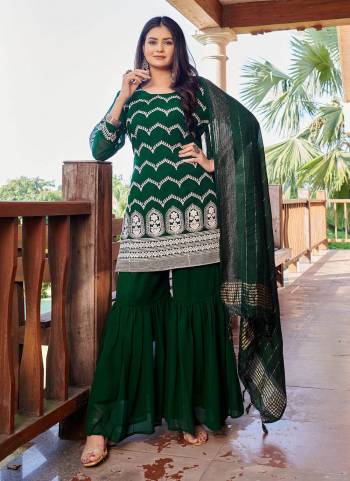 For Pretty Look,Grab These Designer Shahrara Suit In All Over Fine Colored.These Top Is Fabricated On Faux Georgette Pair With Faux Georgette Bottom And Viscose Dupatta.Its Beautified With Designer Embroidery Work.