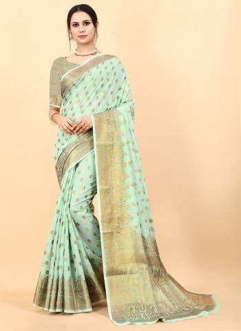 Enhance Your Beauty wearing This Saree In Fine Colored.These Saree Is Fabricated On Soft Cotton Slub Pair With Brocade Silk Blouse.Beautified With Heavy Jari Wevon Designer.