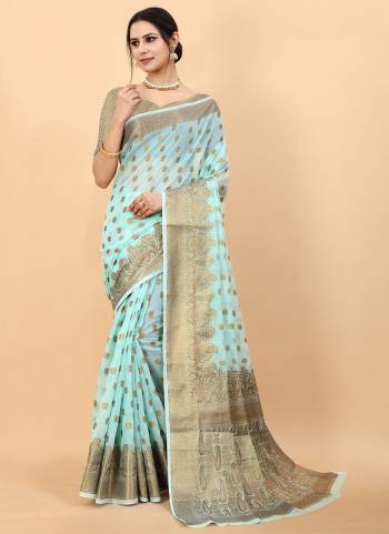 Enhance Your Beauty wearing This Saree In Fine Colored.These Saree Is Fabricated On Soft Cotton Slub Pair With Brocade Silk Blouse.Beautified With Heavy Jari Wevon Designer.