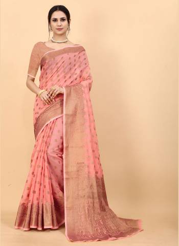 Enhance Your Beauty wearing This Saree In Fine Colored.These Saree Is Fabricated On Soft Cotton Slub Pair With Brocade Silk Blouse.Beautified With Heavy Jari Wevon Designer.
