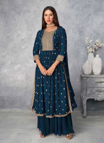 For A Designer Look ,Grab These Sharara Suit In All Over Pretty Colored.These Top Is Fabricated On Georgette Pair With Georgette Bottom And Dupatta.Its Beautified With Heavy Sequance Jari Embroidery Work.