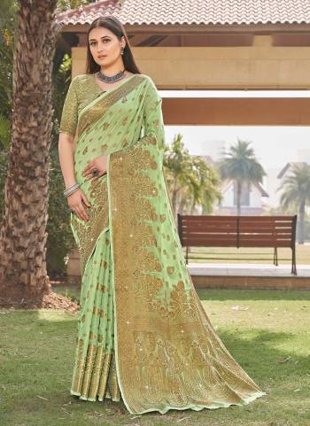 Enhance Your Beauty wearing This Saree In Fine Colored.These Saree Is Fabricated On Cotton Based Pair With Cotton Blouse And Beautified With Jari Wevon Designer Work.