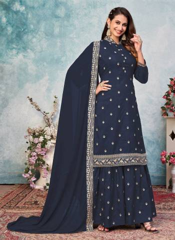 Grab These Semi Stiched Designer Sharara Suit in Lovely Colored Pair With Bottom And Dupatta.These Suit is Fabricated On Art Silk Pair With Art Silk Bottom And Faux Georegette Dupatta.Its Beautified With Heavy Embroidery Work.