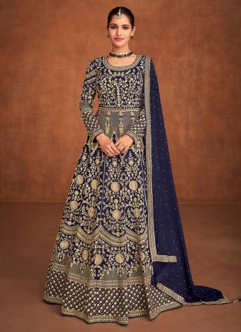 For A Different Look,Grab These Designer Suit in All Over Lovely Colored.These Suit is Fabricated on Georgette Pair With Silk Santoon Bottom And Georgette Dupatta.Its Beautified With Heavy Designer Embroidery Work