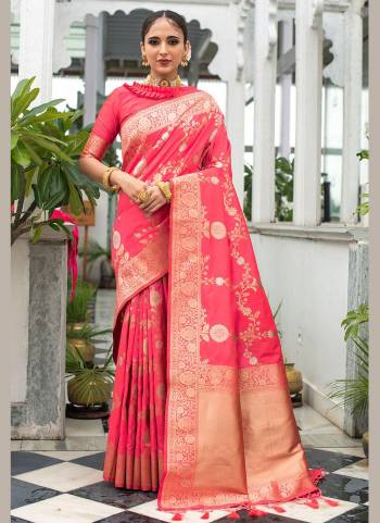 Enhance Your Beauty Wearing This Saree In Pretty Color Paired With Matching Colored Blouse. This Saree Is Fabricated On Banarasi Silk Paired With Banarasi Silk Fabricated Blouse. This Saree Is Beautified With Exclusive Wevon Designer. Buy This Saree Now