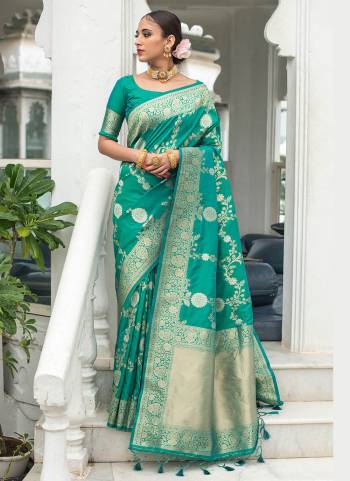 Enhance Your Beauty Wearing This Saree In Pretty Color Paired With Matching Colored Blouse. This Saree Is Fabricated On Banarasi Silk Paired With Banarasi Silk Fabricated Blouse. This Saree Is Beautified With Exclusive Wevon Designer. Buy This Saree Now