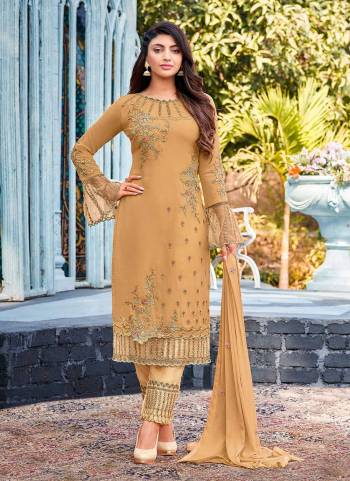 For An Elegant Personality, Grab This Suit In All Over fine Color Paired With Bottom And Dupatta.These Top is Fabricated On Faux Georgette Pair With Santoon Bottom And Chiffon Dupatta.Its Beautified With Designer Work.