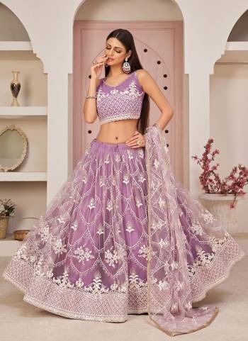 For A Different Look,Grab These Designer Lehenga in All Over Pretty Colored Pair With Blouse And Dupatta.These Lehenga Choli is All Over Net Base Fabric With Designer Work.Buy Now These Lehenga For Up Coming Wedding Season