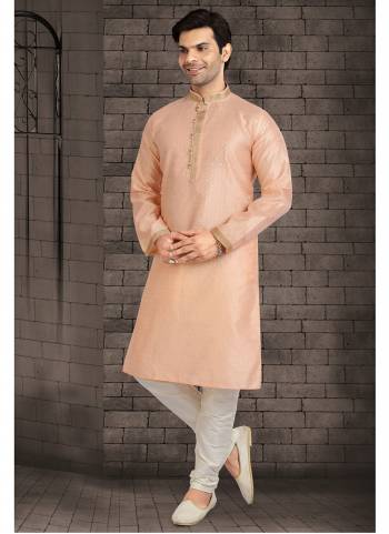 Take your ethnic style quotient to the next level by wearing this fashionable kurta set.Its Come With Jacquard Silk Fabricated Top And Supion Silk Bottom.Buy Now These Amazing Collection.