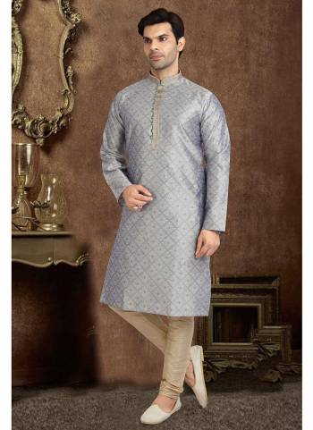 Take your ethnic style quotient to the next level by wearing this fashionable kurta set.Its Come With Jacquard Silk Fabricated Top And Supion Silk Bottom.Buy Now These Amazing Collection.