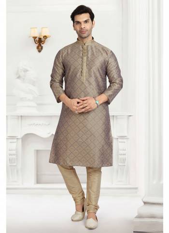 Take your ethnic style quotient to the next level by wearing this fashionable kurta set.Its Come With Jacquard Silk Fabricated Top And Supion Silk Bottom.Buy Now These Amazing Collection.