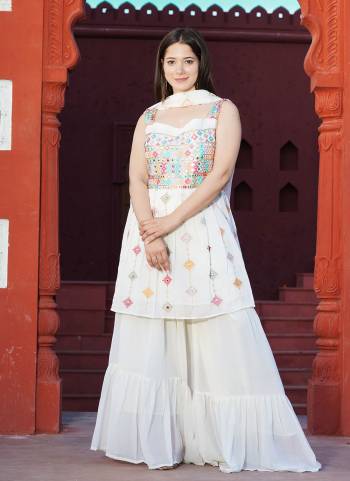 For A Different Look,Grab These Suit in All Over Beautiful Colored.These Suit is Fabricated on All Over Faux Georgette.Its Beautified With Designer Sequance,Mirror Embroidery Work