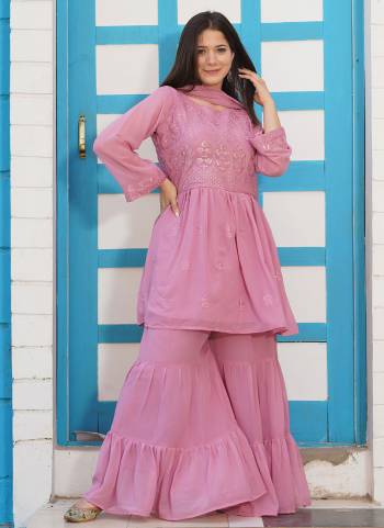 For A Beautiful Look , Grab These Readymade Sharara Suit in All Over Same Colored.These Top And Bottom Are Fabricated On Faux Georgette Pair With Faux Georgette Dupatta.Its Beautified With Designer Work.These Suit Available in All Regular Size.