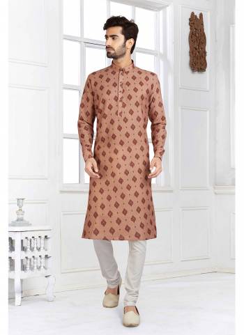 Take your ethnic style quotient to the next level by wearing this fashionable kurta set.Its Come With Cotton Fabricated Top And Art Silk Bottom.Buy Now These Amazing Collection.