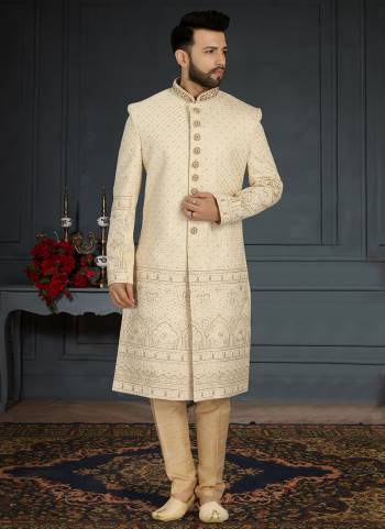 Take your ethnic style quotient to the next level by wearing this fashionable Set.These Sherwani is Fabricated On Jacquard Silk Pair With Dupion Silk Bottom .Its Come With Heavy Designer Work.