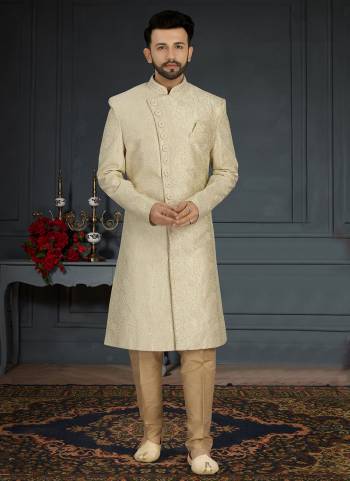 Take your ethnic style quotient to the next level by wearing this fashionable Set.These Sherwani is Fabricated On Jacquard Silk Pair With Dupion Silk Bottom .Its Come With Heavy Designer Work.