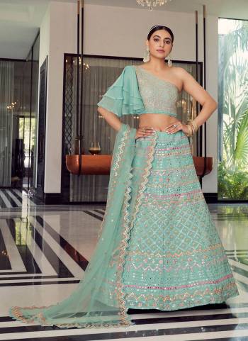 For A Designer Look, Grab These Heavy Designer Lehenga in Beautiful Colored Pair With Pretty Blouse And Dupatta.These Lehenga And Blouse Are Fabricated On Organza pair With Soft Net Dupatta.Its Beautified With Designer Work.