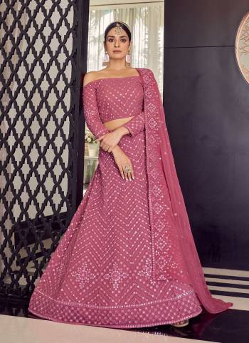 For A Designer Look, Grab These Heavy Designer Lehenga in Beautiful Colored Pair With Pretty Blouse And Dupatta.These Lehenga And Blouse Are Fabricated On Georgette pair With Georgette Dupatta.Its Beautified With Designer Work.