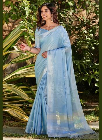 Grab These Beautiful Saree in All Over Fine Colored.These Saree And Blouse Are Fabricated On Tissue Linen Based.Its Beautified With Silver Jari Wevon Temple Designer Work.