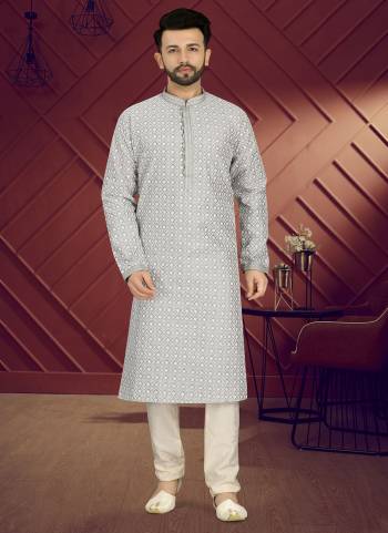 Take your ethnic style quotient to the next level by wearing this fashionable kurta set.Its Come With Art Silk Fabricated Top And Cotton Fabricated Bottom.Its Beautified With Heavy Designer Lukhnowi Work.Buy Now These Amazing Collection