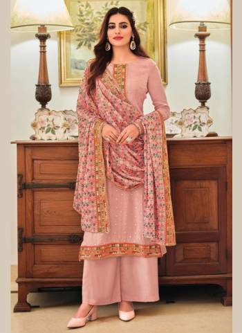 For A Designer Look,Grab These Suit in All Over Beautiful Colored Pair With Sharara Bottom And Designer Dupatta.These Suit And Dupatta Are Fabricated On Georgette Pair With Santoon Bottom.Its Beautified With Heavy Designer Embroidery And Diamond Work.