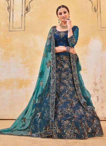 Grab These Heavy Designer Lehenga Choli in Beautiful Colored Pair Wth Designer Blouse And Dupatta.These Lehenga And Blouse Are Fabricated on Net Based Pair With Soft Net Dupatta.Its Beautified With Heavy Designer Work.