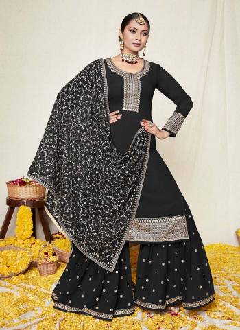 For A Designer Look,Grab These Sharara Suit in Lovely Colored Pair With Bottom And Dupatta.These Top And Dupatta Are Fabricated On Georgette Pair With Santoon Bottom.Its Beautified With Heavy Designer Work.