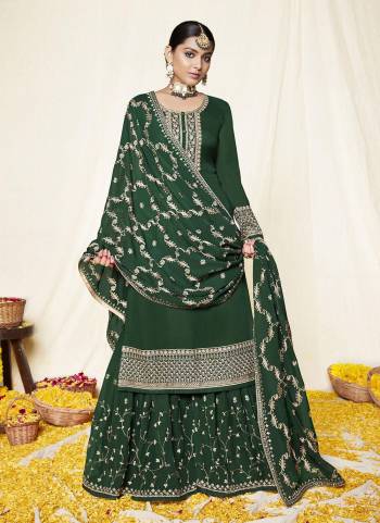 For A Designer Look,Grab These Sharara Suit in Lovely Colored Pair With Bottom And Dupatta.These Top And Dupatta Are Fabricated On Georgette Pair With Santoon Bottom.Its Beautified With Heavy Designer Work.