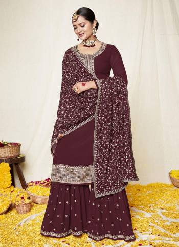 For A Designer Look,Grab These Sharara Suit in Lovely Colored Pair With Bottom And Dupatta.These Top And Dupatta Are Fabricated On Georgette Pair With Santoon Bottom.Its Beautified With Heavy Designer Work.