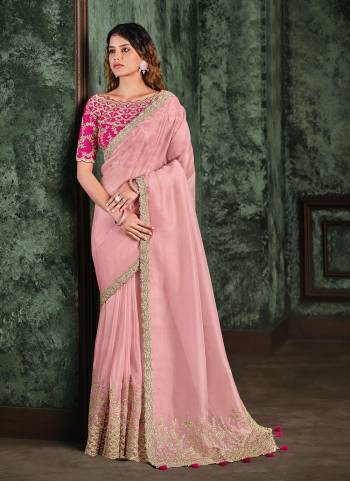 For A Designer Look,Grab These Saree in All Over Beautiful Colored.These Saree is Fabricated On Net Organza Pair Wth Raw Silk Blouse.Its Beautified With Heavy Designer Work.