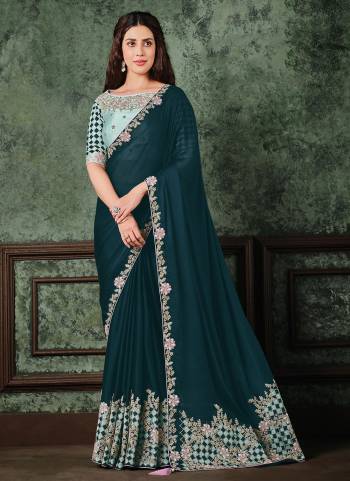 For A Designer Look,Grab These Saree in All Over Beautiful Colored.These Saree is Fabricated On Silk Georgett Pair Wth Taffeta Silk Blouse.Its Beautified With Heavy Designer Work.