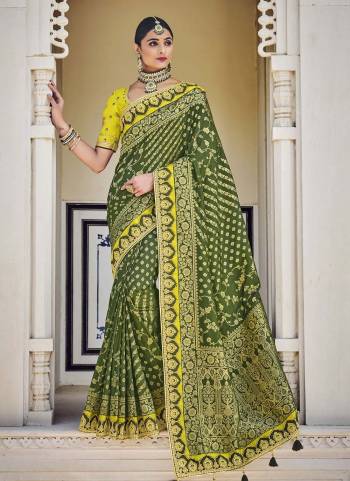 For A Different Look , Grab These Beautiful Saree in Fine Colored.These Saree is Fabricated On Banarasi Silk Pair With Raw Silk Blouse.Its Beautified With Heavy Wevon Designer And Embroidery Work.