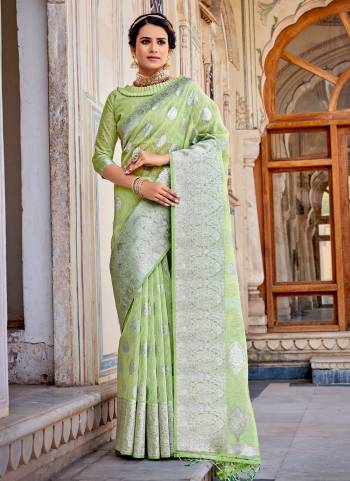 Grab These Saree in Beautiful Colored Pair With atching Blouse.These Saree And Blouse Are Fbaricated On Linen Based.Its Beautified With Heavy Silver Jari Wevon Designer Work.Buy Now
