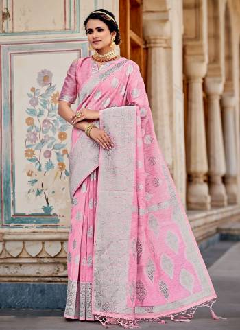 Grab These Saree in Beautiful Colored Pair With atching Blouse.These Saree And Blouse Are Fbaricated On Linen Based.Its Beautified With Heavy Silver Jari Wevon Designer Work.Buy Now