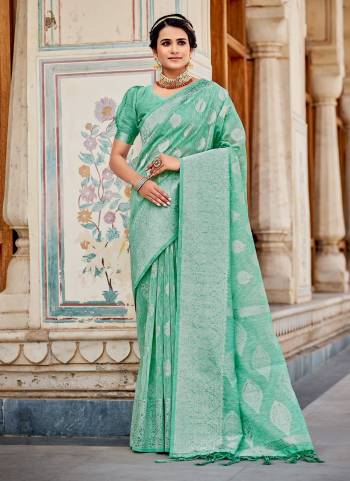 Grab These Saree in Beautiful Colored Pair With atching Blouse.These Saree And Blouse Are Fbaricated On Linen Based.Its Beautified With Heavy Silver Jari Wevon Designer Work.Buy Now