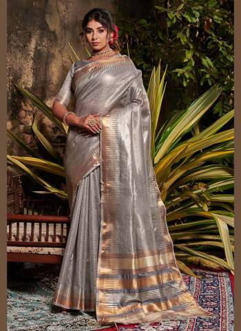 Different Looking Saree is Here,Grab These Saree in All Over Fine Colored.These Saree And Blouse Are Fabricated On Tissue Linen Based.Its Beautified With Exclusive Silver Jari Wevon Designer Work.