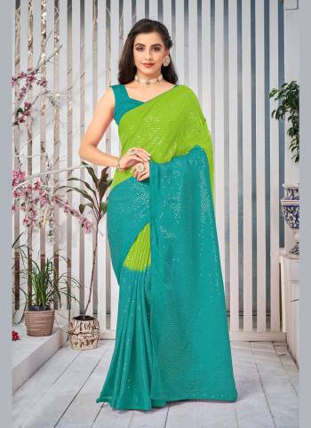 Enhance Your Beauty Wearing This Saree In Lovely Color Paired With Blouse. This Saree is Fabricated on Chiffon Pair WIth Dupion Silk Blouse.Its Beautified With Designer Work.