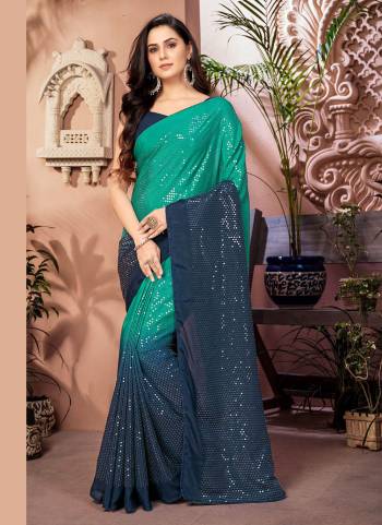 Enhance Your Beauty Wearing This Saree In Lovely Color Paired With Blouse. This Saree is Fabricated on Chiffon Pair WIth Dupion Silk Blouse.Its Beautified With Designer Work.