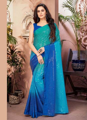 Enhance Your Beauty Wearing This Saree In Lovely Color Paired With Blouse. This Saree is Fabricated on Chiffon Pair WIth Dupion Silk Blouse.Its Beautified With Designer Work.