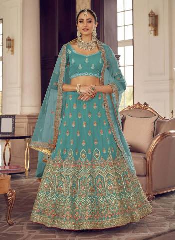 Look Pretty In This Lovely Shade With This Designer Heavy Lehenga Choli In?All Over Fine Colored.These Lehenga And Blouse Are Fabricated On Organza Based Pair With Soft Net Dupatta.Its Beautified With Heavy Designer Work.