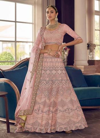 Look Pretty In This Lovely Shade With This Designer Heavy Lehenga Choli In?All Over Fine Colored.These Lehenga And Blouse Are Fabricated On Crepe Based Pair With Soft Net Dupatta.Its Beautified With Heavy Designer Work.