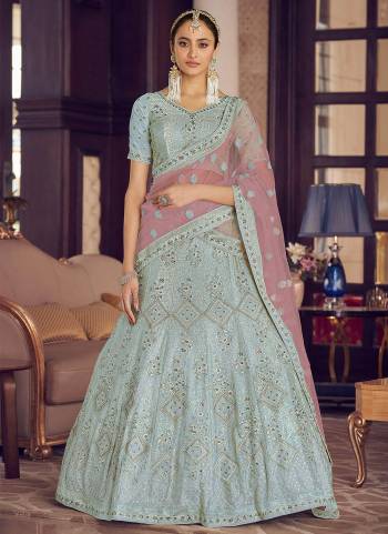 Look Pretty In This Lovely Shade With This Designer Heavy Lehenga Choli In?All Over Fine Colored.These Lehenga And Blouse Are Fabricated On Crepe Based Pair With Soft Net Dupatta.Its Beautified With Heavy Designer Work.