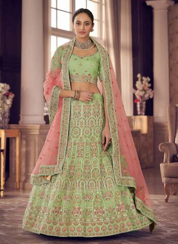 Look Pretty In This Lovely Shade With This Designer Heavy Lehenga Choli In?All Over Fine Colored.These Lehenga And Blouse Are Fabricated On Organza Based Pair With Soft Net Dupatta.Its Beautified With Heavy Designer Work.