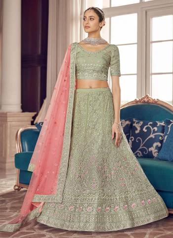 Look Pretty In This Lovely Shade With This Designer Heavy Lehenga Choli In?All Over Fine Colored.These Lehenga And Blouse Are Fabricated On Organza Based Pair With Soft Net Dupatta.Its Beautified With Heavy Designer Work.