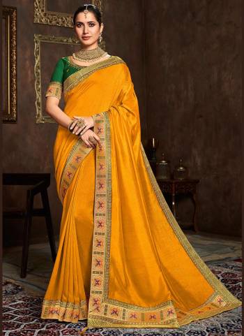 Add This Pretty Attractive Saree To Your Wardrobe.These Saree is Fabricated On Vichitra Silk Pair With Phantom Silk Blouse.Its Beautified With Designer Work.Buy Now