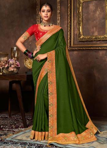 Add This Pretty Attractive Saree To Your Wardrobe.These Saree is Fabricated On Vichitra Silk Pair With Phantom Silk Blouse.Its Beautified With Designer Work.Buy Now