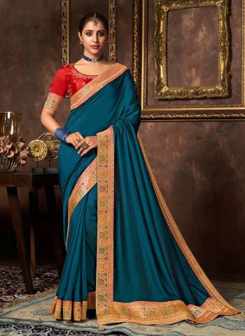 Add This Pretty Attractive Saree To Your Wardrobe.These Saree is Fabricated On Vichitra Silk Pair With Phantom Silk Blouse.Its Beautified With Designer Work.Buy Now