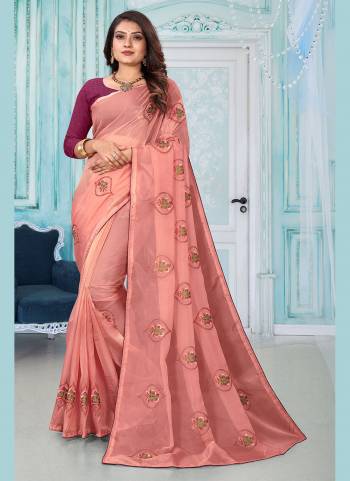 Add This Pretty Attractive Saree To Your Wardrobe.These Saree is Fabricated On Organza Pair With Dupion Silk Blouse.Its Beautified With Designer Resham Embroidery Work.