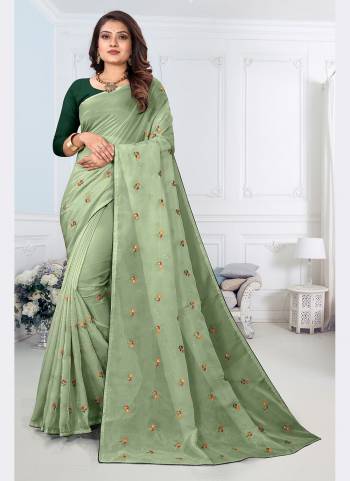 Add This Pretty Attractive Saree To Your Wardrobe.These Saree is Fabricated On Organza Pair With Dupion Silk Blouse.Its Beautified With Designer Resham Embroidery Work.